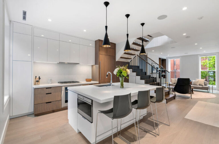 Hancock Kitchen stairBlog; Renovated kitchen on Hancock Street, designed by ArnoldAnd to balance historic brownstone charm with modern functionality. Custom millwork and built-in storage solutions at 47 Hancock Street by ArnoldAnd. Reconfigured floor plan enhancing flow and functionality in this Boston brownstone renovation by ArnoldAnd.