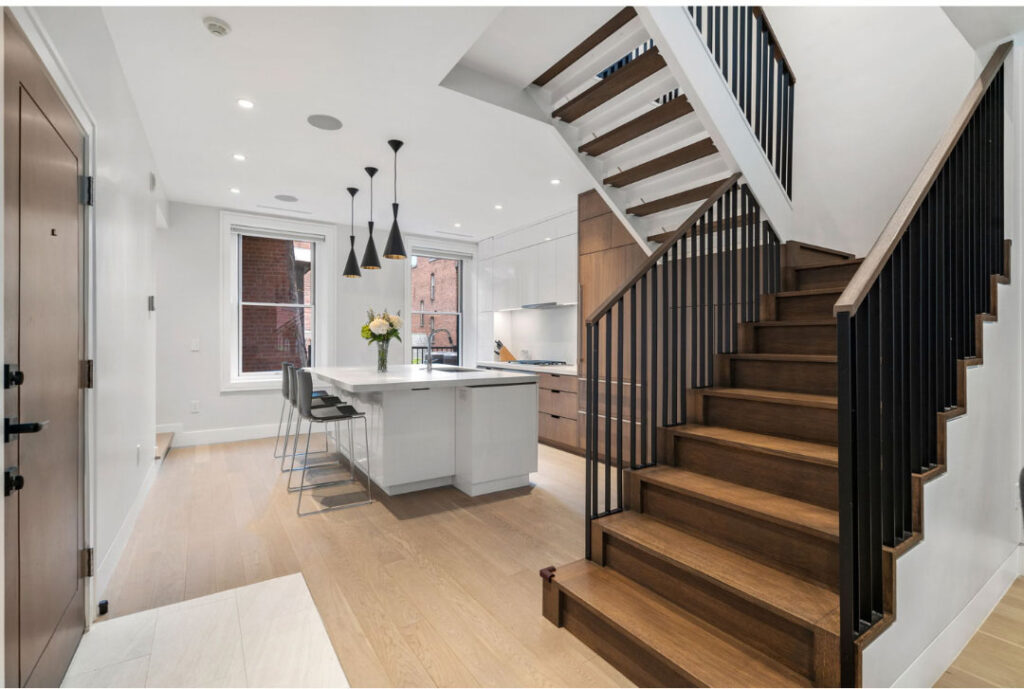 Hancock street Kitchen stairwayBlog Renovated kitchen on Hancock Street, designed by ArnoldAnd to balance historic brownstone charm with modern functionality. Custom millwork and built-in storage solutions at 47 Hancock Street by ArnoldAnd. Reconfigured floor plan enhancing flow and functionality in this Boston brownstone renovation by ArnoldAnd.