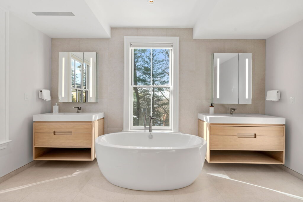 Primary bathroom renovation Newton MA with clean modern finishes