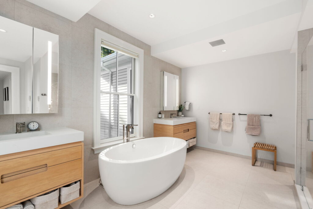 rimary bathroom renovation Newton MA with clean modern finishes