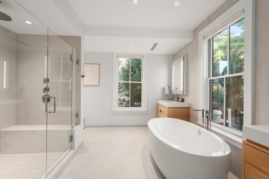 Primary bathroom renovation Newton MA with clean modern finishes