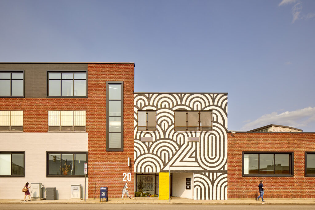 Iron Works is a large-scale adaptive reuse and repositioning of a historic industrial complex in South Boston. The project transforms a former mill into a vibrant, mixed-use destination, bringing together food, fitness, and production under one cohesive identity.