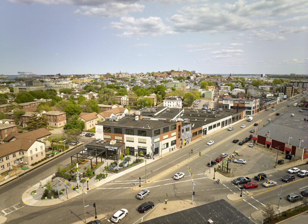 Iron Works is a large-scale adaptive reuse and repositioning of a historic industrial complex in South Boston. The project transforms a former mill into a vibrant, mixed-use destination, bringing together food, fitness, and production under one cohesive identity.