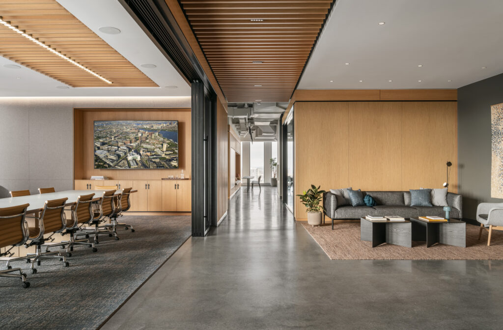 This 25,000-square-foot office for Biomed Realty rethinks workplace design through a more human, residential lens. Located in Kendall Square, the project balances the precision of a high-performance workplace with the comfort and fluidity of domestic space.